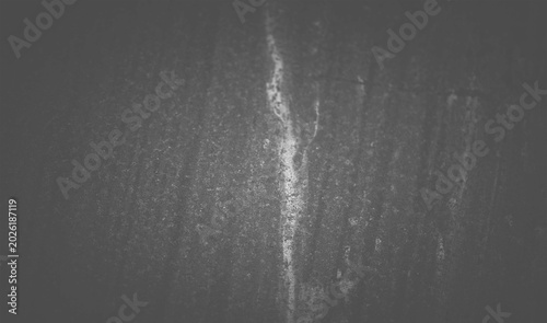 Photos Dark black wood grain surface texture with faint white streak and scratch