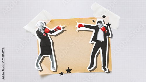 Schilderij op canvas Two figures are engaged in a playful boxing match, representing competition in a business setting
