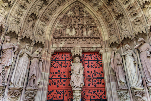 Obraz na plátně Ornate gothic tympanum with statues at Saint Pierre Church in Strasbourg, France