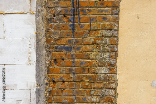 Bild auf Leinwand Detailed photograph capturing intricate brick and plaster craftsmanship elements
