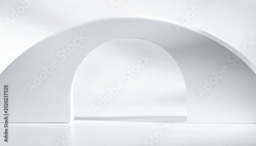 Isolated white styrofoam arch shape, textured porous polystyrene foam material, portal frame for photography display and product staging