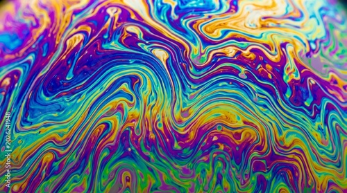 Vibrant swirling colors of a soap bubble surface
