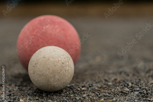 White Bocce Ball with Red Ball with Copy Space Right