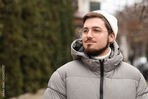 Stylish young man wearing p...