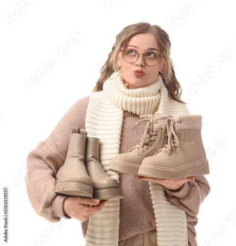 Thoughtful young woman with...