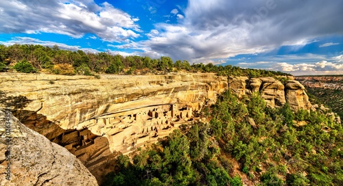 Fényképezés Cliff Palace ruins sit in alcove of sandstone canyon in Mesa Verde National Park, Colorado