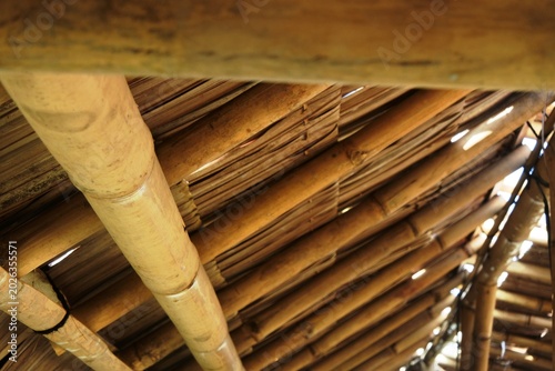 The thatched coconut leaf roof with a structure made of bamboo