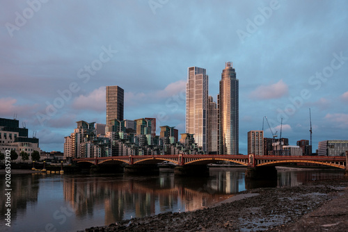 London cityscape with river thames and modern skyscrapers
