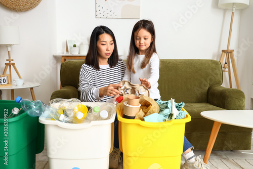 Asian mother with her littl...