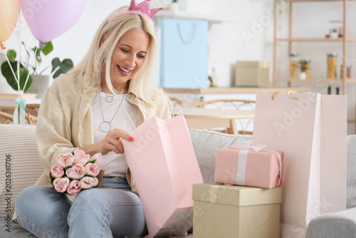Mature woman celebrating Bi...