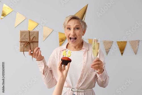 Mature woman with birthday ...