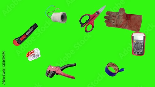 Collection of electrical and repair tools floating on a green background