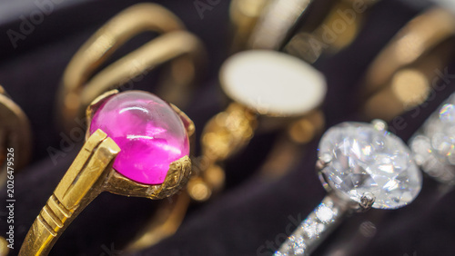 Canvas Print Gold jewelry pink diamond rings show in luxury retail store display showcase