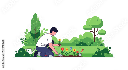 Man planting flowers in a garden bed.