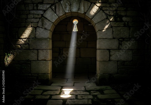 Mysterious Stone Archway Illuminated by Keyhole Light in Dark Medieval Dungeon