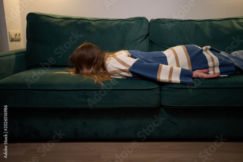 Tableau sur toile Burnout and Overwhelming Fatigue on the Sofa