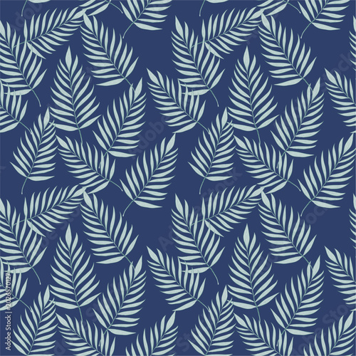 Luxury seamless tropical pattern with palm leaves on dark navy blue background