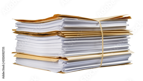 Tableau sur toile Thick stack of documents and manila folders tied with rubber band, isolated on t