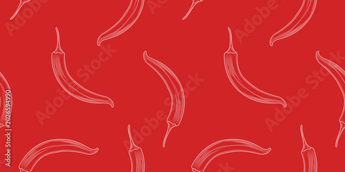 Seamless pattern of hand drawn hot chilli cayenne pepper in engraved style on a red background