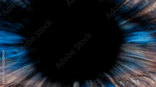 Close-up of a human eye with striking blue iris and detailed eyelashes, showcasing the intricate patterns and textures of the eye in a well-lit environment