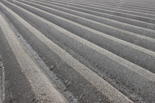 Tableau sur toile Ridges and furrows in a ploughed field