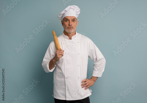 Schilderij op canvas cooking, culinary and people concept - happy smiling male chef or baker in toque