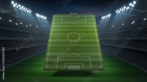 Empty soccer football field at night with bright stadium lights