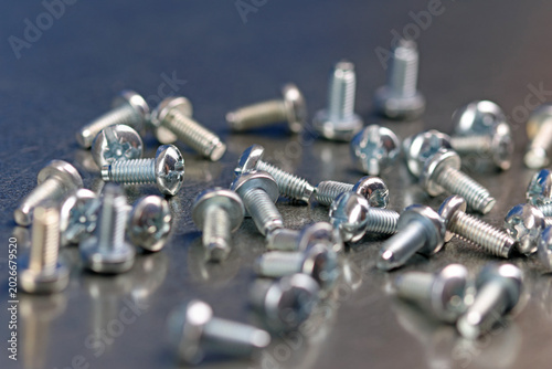 Metal mounting screws close-up. Macro image.