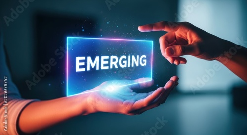 Person holding glowing digital screen with word emerging, for innovation, growth, new business opportunities, futuristic technology, start successful venture