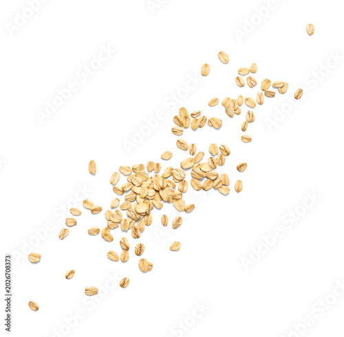 Foto Scattered oat flakes on a clean white background