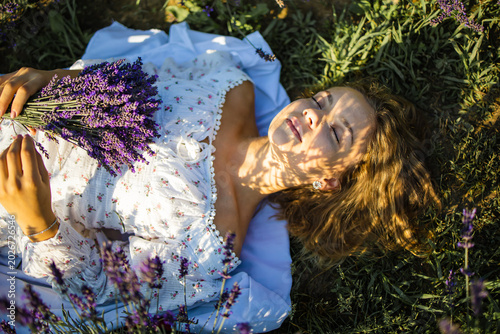Φωτογραφία Close-up of Blonde Female Model in Lavender Meadow, Golden Hour Stock Photo