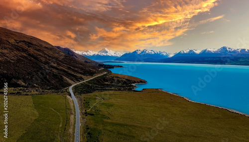 The aerial view with evening scene and coast of road highway with mountain landscape view background