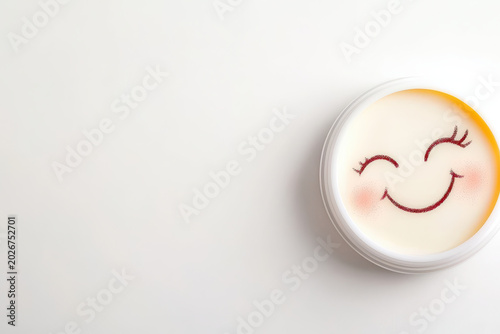 Cheerful container with smiling face design, featuring bashful expression, evokes sense of joy and playfulness