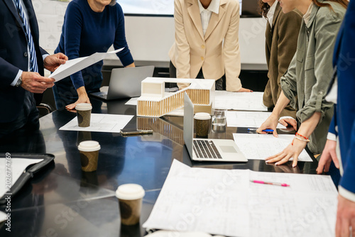 Εκτύπωση καμβά Team of architects and business professionals meeting in office, reviewing build