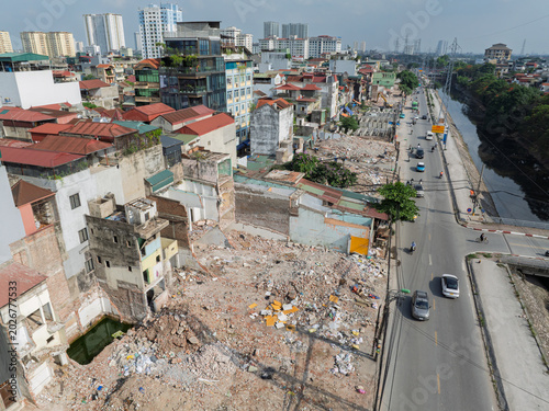 Foto Drone view of demolished housing blocks and cleared construction zone prepared for Tam Trinh Road widening in Hanoi