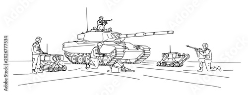 Fotografija tank being loaded with ammunition and tactical robots
