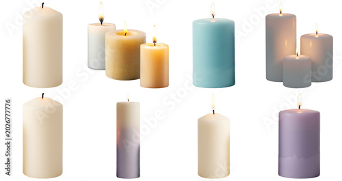Foto Collection of various lit and unlit pillar candles in different colors and sizes, isolated on a white background