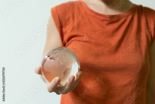 A person's hand gently hold...