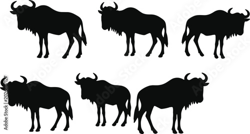 Canvas Print African wildebeest wild animal black silhouette vector set with horned gnu safar