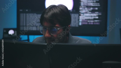 Software Developer Face with Digital Code Reflection on Eyeglasses