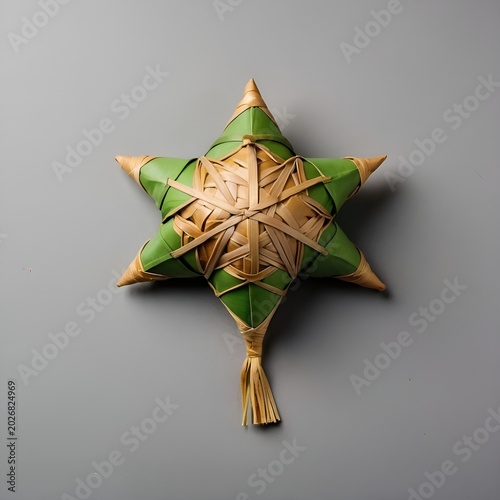 top view ketupat placed at corner, neutral background, minimal layout, center empty space for greeting text