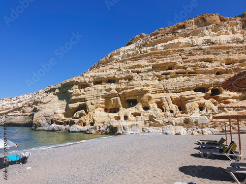 Matala beach and its caves, popular beach in Southern Crete Island, Crete Island, Grece
