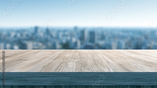 A wooden table in front of a blurred city skyline on a clear day