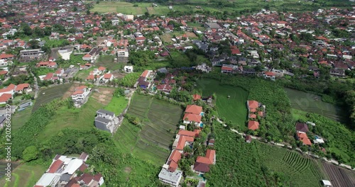 Bali faces challenges from development, overtourism, and water shortage impacting agricultural land and environment in 2023