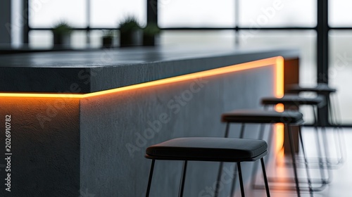 Modern kitchen island with warm ambient lighting and bar stools