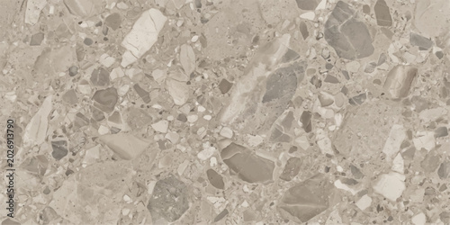 Foto Close-up textured background of variegated grey terrazzo with chunky, irregularly shaped stone fragments embedded within a concrete-like matrix, offering a durable and decorative surface