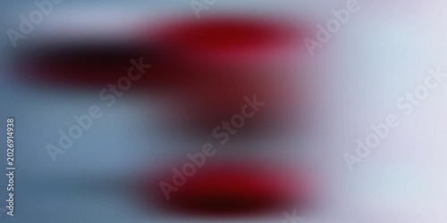 Abstract grainy gradient background with horizontal motion blur and dark red shapes