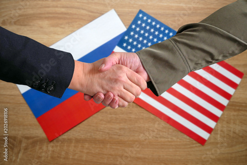 Obraz na płótnie Handshake Between Russia and USA Flags