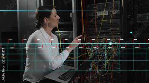 Woman IT tech holding laptop, monitoring readout with AR overlays, reseating cables verifying link