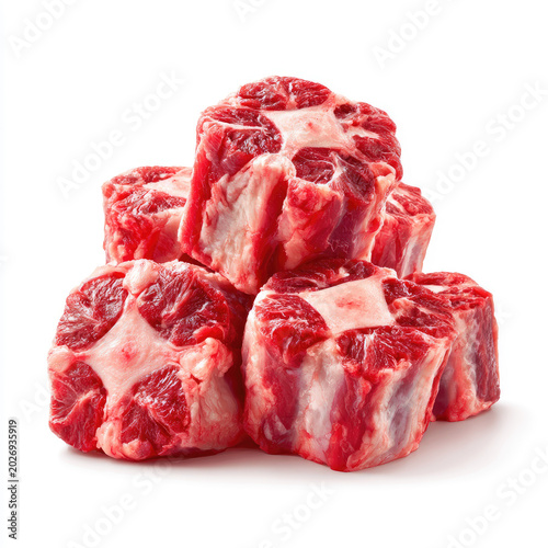 Stacked raw oxtail cuts with bone marrow cross‑sections
